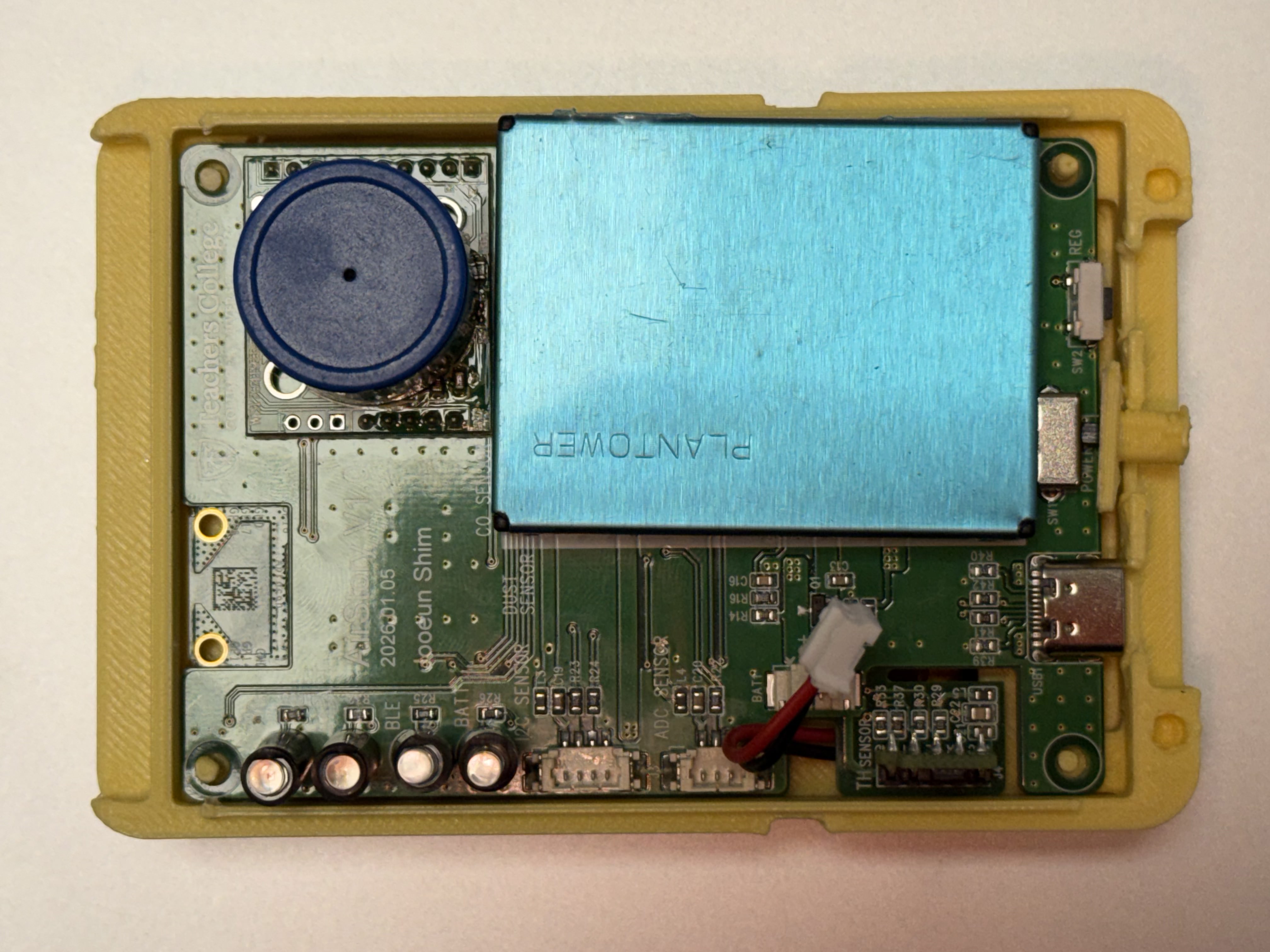 Case open from top — AirStory PCB, PLANTOWER PM2.5, ME2-CO sensor all visible